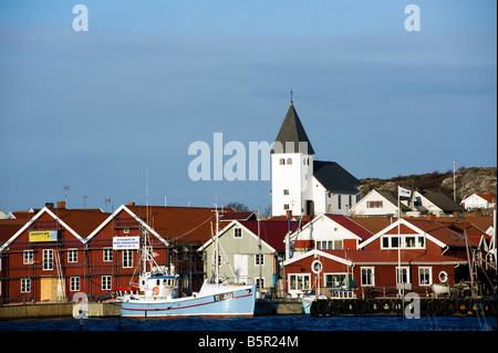 Brightly painted houses in village of Skarhamn on Sweden`s Bohuslan coast Stock Photo